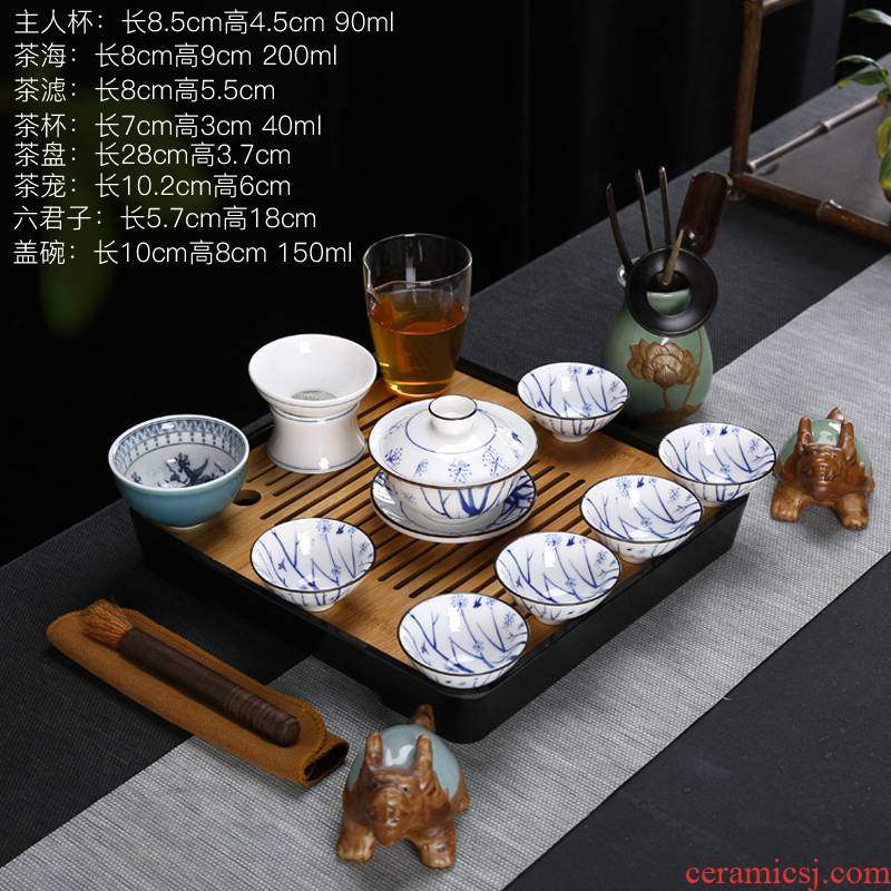 Travel pad printing white porcelain of a complete set of kung fu tea set suet jade porcelain ceramic cups lid to use bamboo tea tray