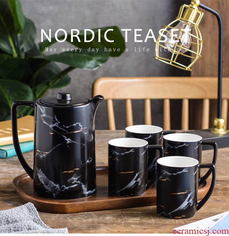 The Nordic idea ceramic tea set suits for domestic large capacity flower pot male move woman pure manual small tea cups