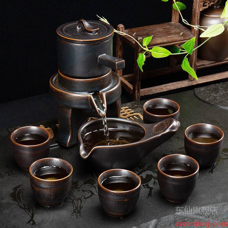 Ceramic semi - automatic lazy all tea sets kung fu tea cups of a complete set of household Shi Mopan contracted tea teapot