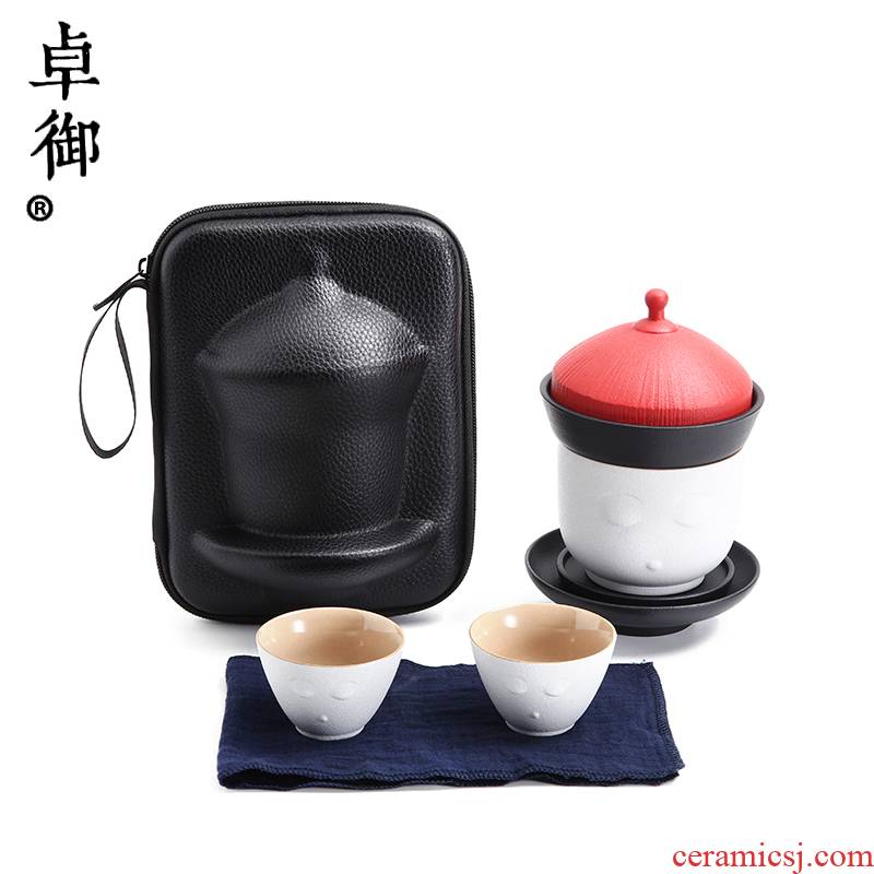 Zhuo imperial travel tea set to crack a cup of tea set a pot of four cups of tea set, ceramic work outdoors with the teapot
