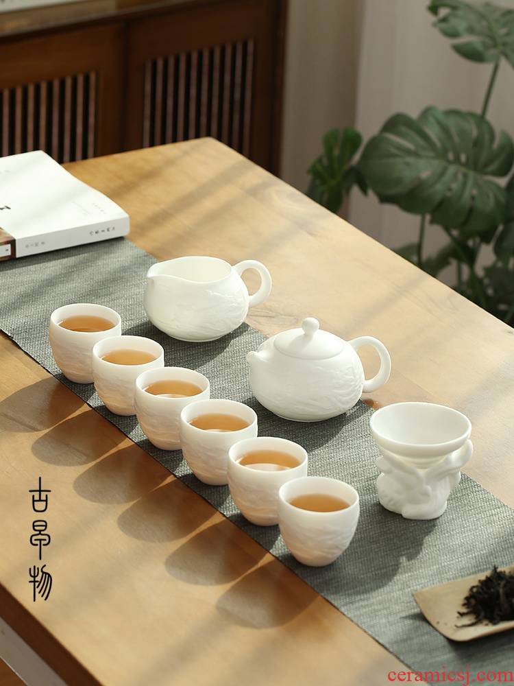 Dehua suet jade biscuit firing manual white porcelain kung fu tea set suit household ceramic teapot of a complete set of tea cups
