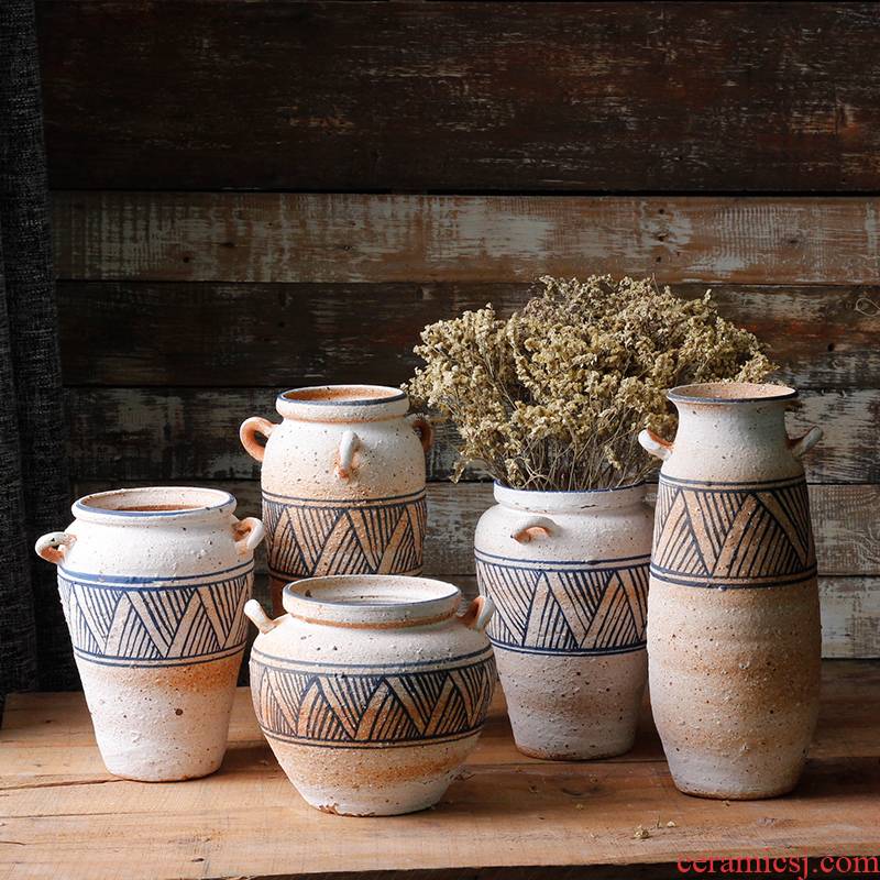 Checking coarse TaoHua hand - made earthenware vase crafts