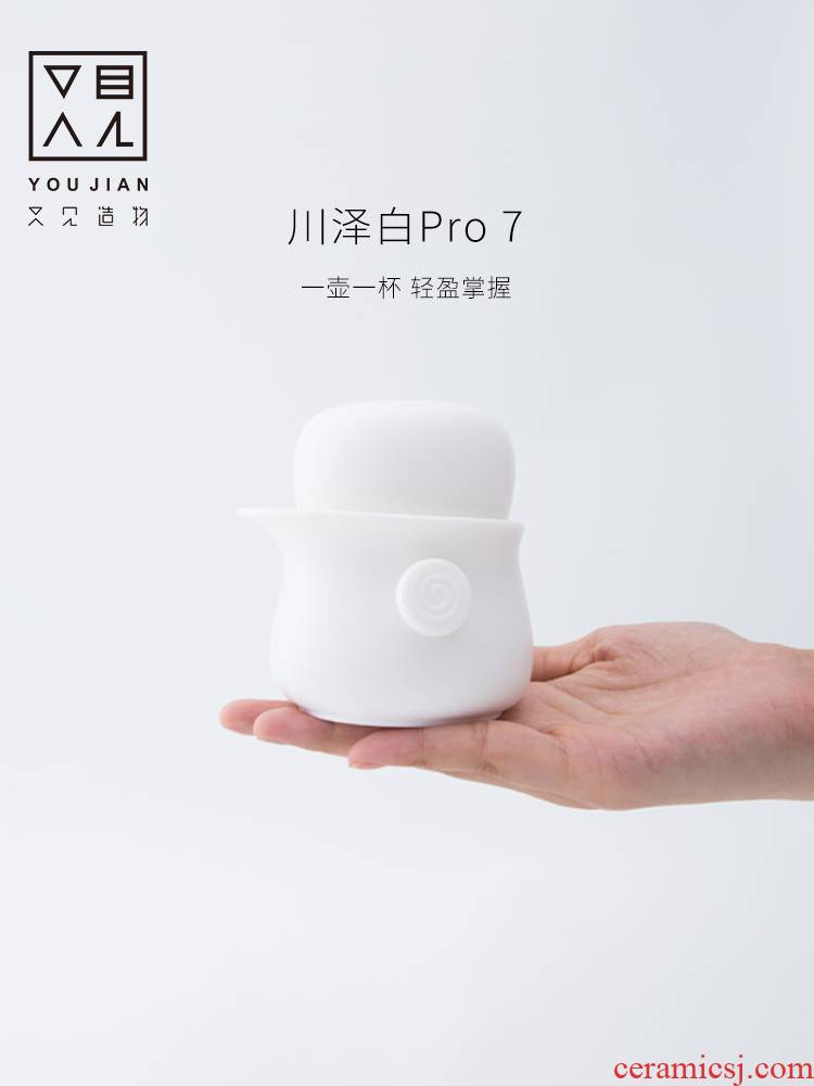 Portable travel and creation of dehua white porcelain kung fu tea set to crack a pot of three car travel