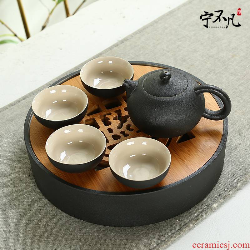 Rather uncommon black pottery tea set a pot of travel four cups of tea, black pottery glaze thick ceramic crack cup teapot tea tray