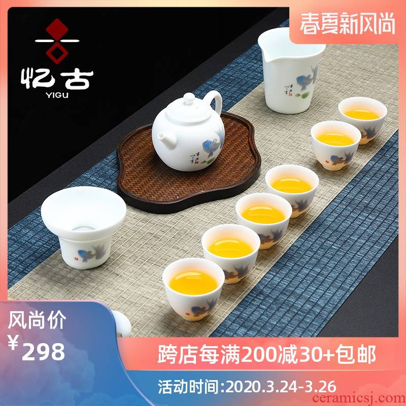 Have the suet jade dehua white porcelain tea set household kung fu tea tea cup lid bowl of a complete set of gift box