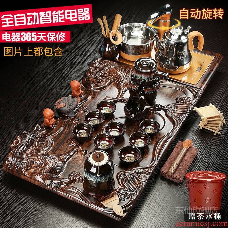 A complete set of violet arenaceous kung fu tea tea cup automatic appliances solid wood tea tray tea set home