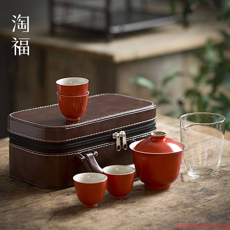 Kung fu tea set a pot of jingdezhen ceramic travel four cups of portable is suing tourism tea crack cups