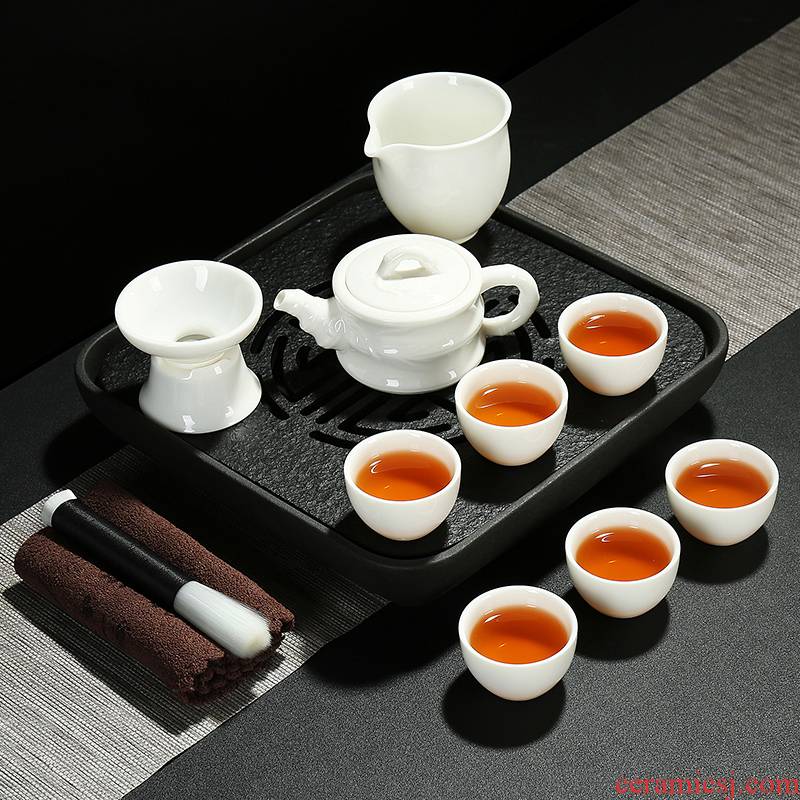 Dehua white porcelain kung fu tea teapot home office of a complete set of tureen tea cup stone tea tray was black stone tea tray