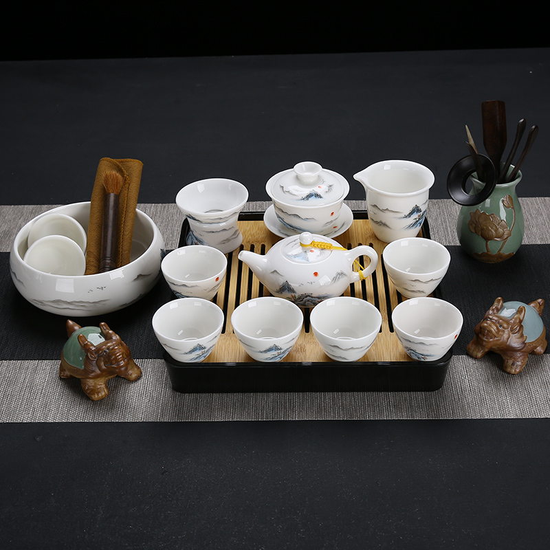 Fujian macros suet jade porcelain kung fu tea set suit household dehua white porcelain tea set teapot teacup of a complete set of gift box