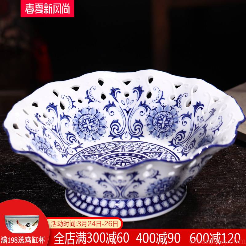 Blue and white hollow ceramic high fruit bowl jingdezhen porcelain basket candy plate of new Chinese style of modern home decoration