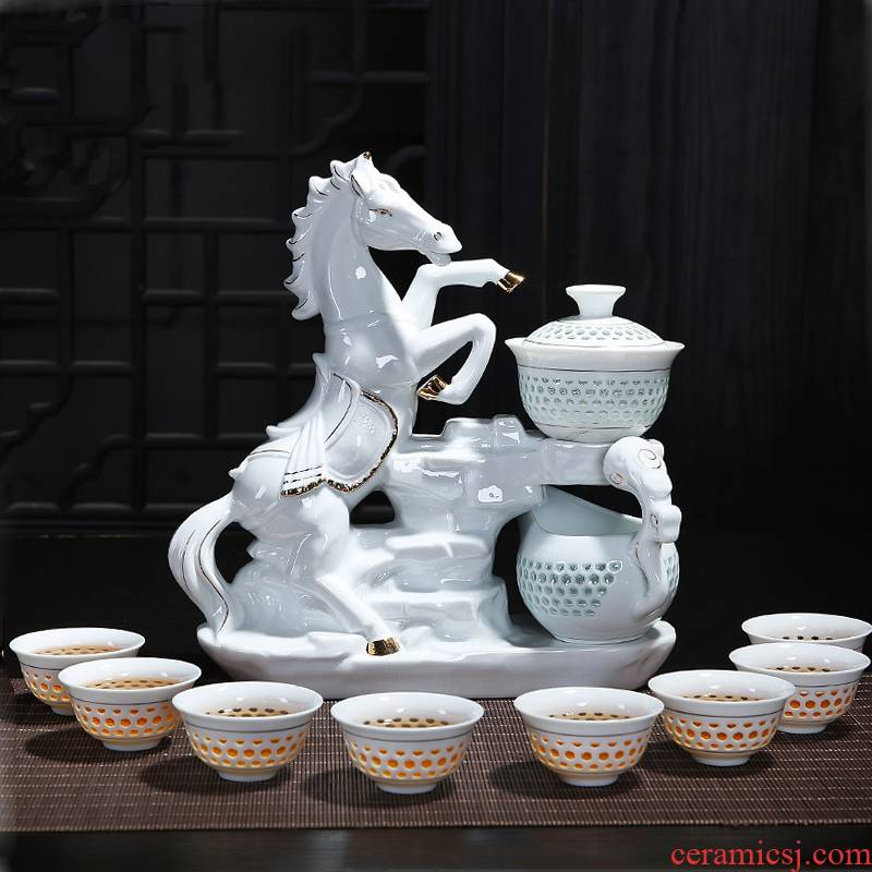 Creative blue and white porcelain ceramic kung fu tea sets with ceramic and exquisite hollow out of a complete set of automatic tea set