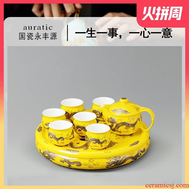 The porcelain yongfeng source yellow fury of The dragon emperor pu 'er tea suit to filter The teapot tea tray cups ceramic cup