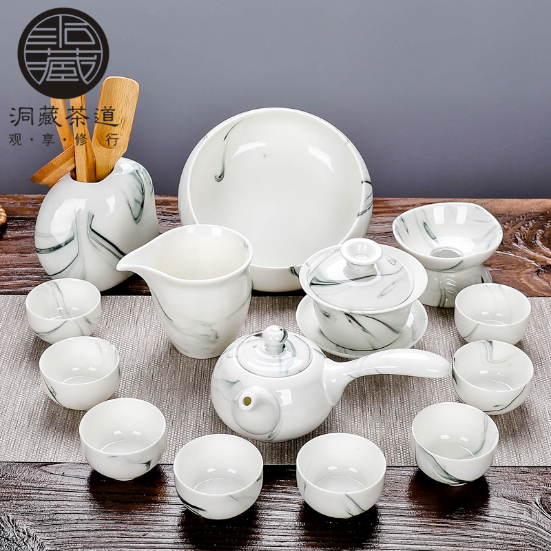 Building In hand - made kung fu tea set household contracted blue and white porcelain ceramic dehua white porcelain tea set. A complete set of tea cups