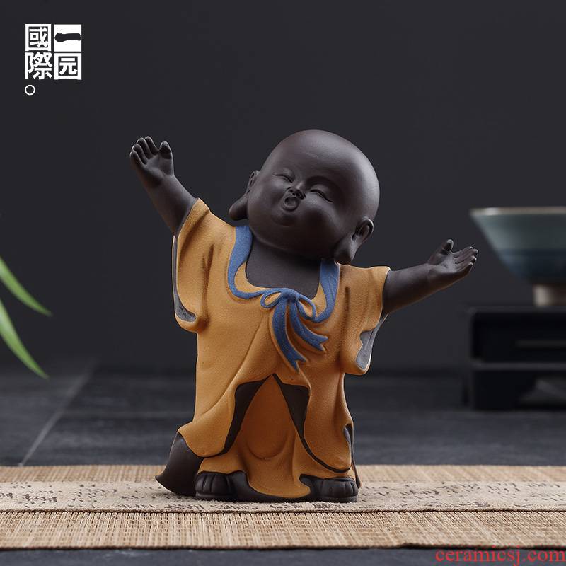 A garden international ceramic tea spoil the young monk tea accessories creative small place kung fu tea accessories