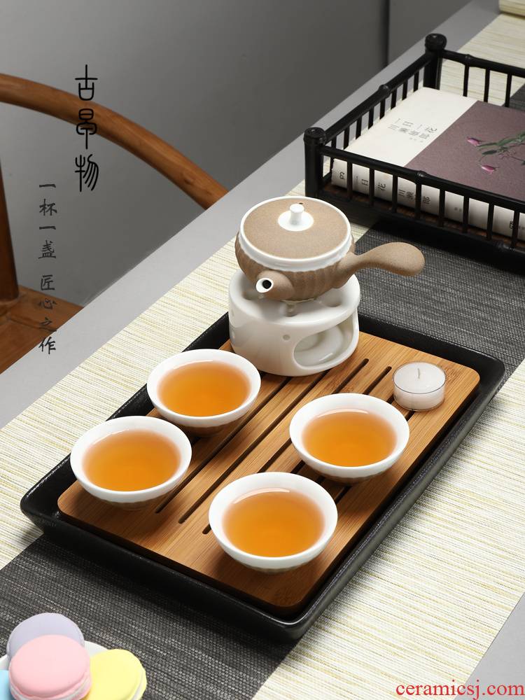 Portable travel tea set with black pottery of a complete set of kung fu tea set small sets of is suing temperature to boil tea pot dishes