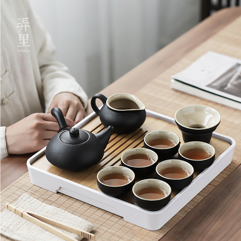 Kung fu tea set suit household contracted the teapot tea tray ceramic portable travel Japanese tea tea set office