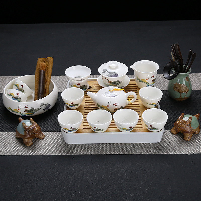 Dehua suet jade white porcelain kung fu tea set home sitting room hand - made ceramic tea tea tureen tea cup