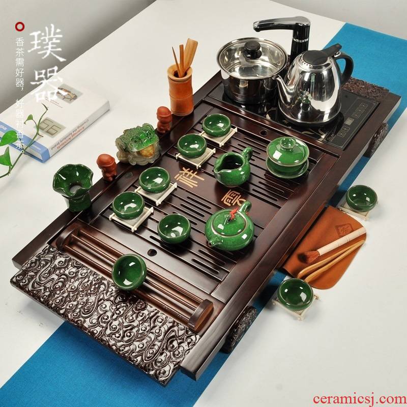Brand to implement four unity of household electric heating furnace solid wood tea tray was set a complete set of violet arenaceous kung fu tea tea set drainage type