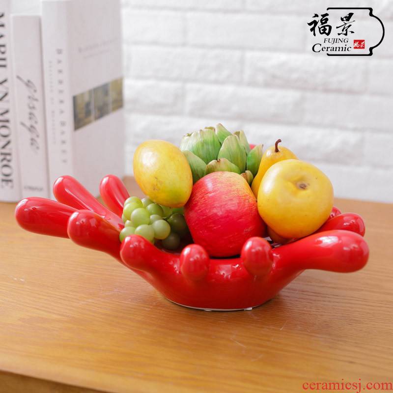 The scene household ornaments creative ceramic plate is placed palm fruit bowl dried fruit surroundings while snack plate decoration