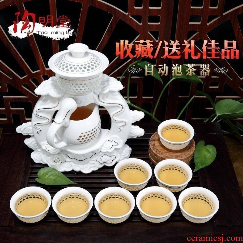 Fully automatic and exquisite tea sets suit household lazy people of blue and white porcelain tea set ceramic creative hollow out of a complete set of kung fu tea set
