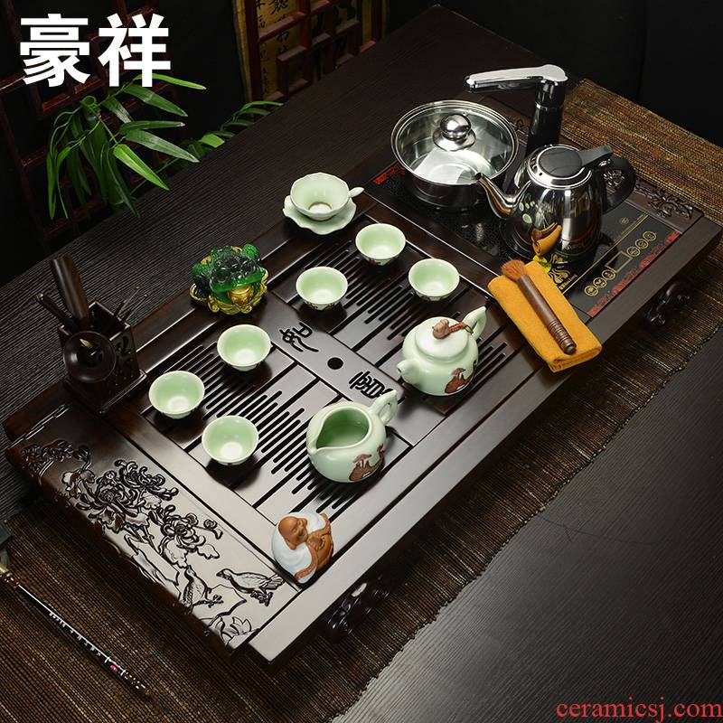 Howe auspicious solid wood tea tray of a complete set of suit induction cooker suit purple ice crack kung fu tea set four unity