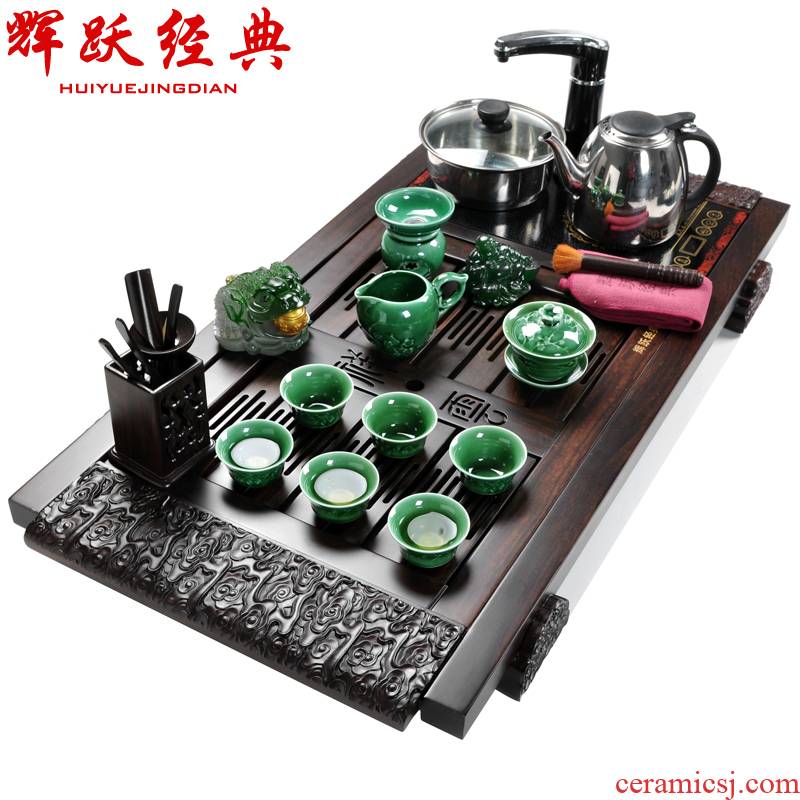 Hui make ebony tea tray induction cooker four purple sand tea set tea service of a complete set of black TanXiangYun combination