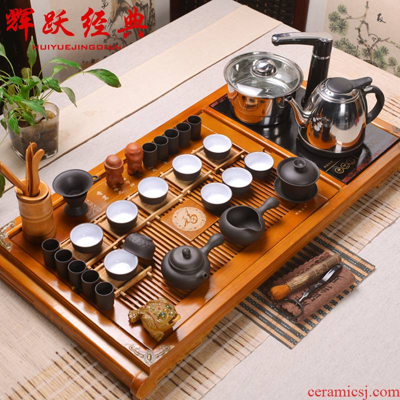 Hui make induction cooker four unity of yixing purple sand tea set a complete set of kung fu tea tea set buford tea tray