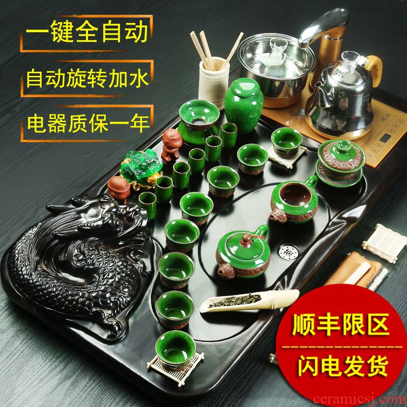 Porcelain heng tong tea cups suit household contracted purple sand pottery and Porcelain of a complete set of kung fu tea set automatic tea tea tray