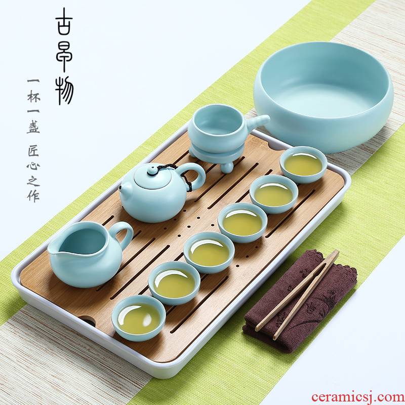 Your up with porcelain of a complete set of kung fu tea set suit household porcelain travel portable cup lid bowl of Japanese tea tray