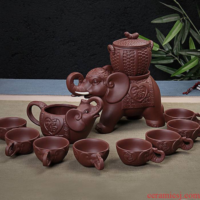 Xin edge of purple sand semi - automatic tea set suit creative hot tea. Preventer elephant teapot a complete set of kung fu tea set