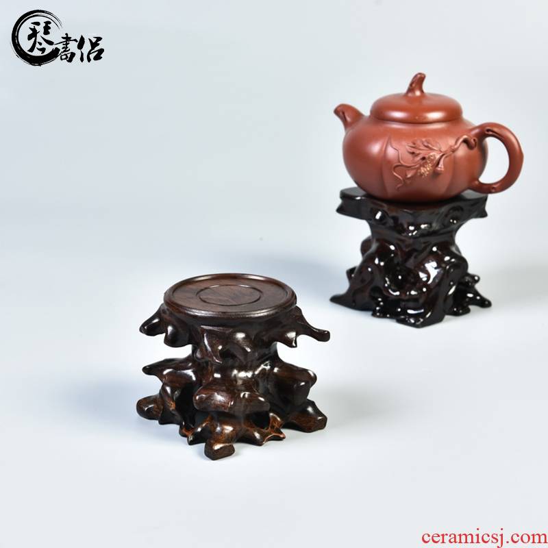 The teapot base hand - carved monolith ebony it planter base solid wood round stone base can be excavated