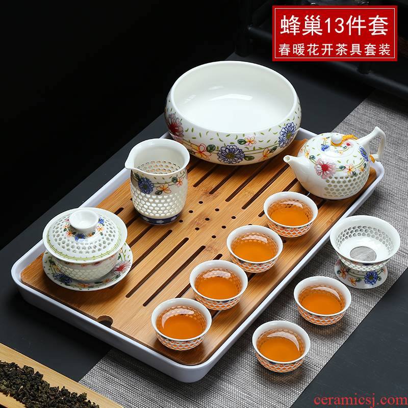 Exquisite blue and white porcelain tea set kit cellular hollow ceramic kung fu tea tea tray was set the set of coasters teapot teacup