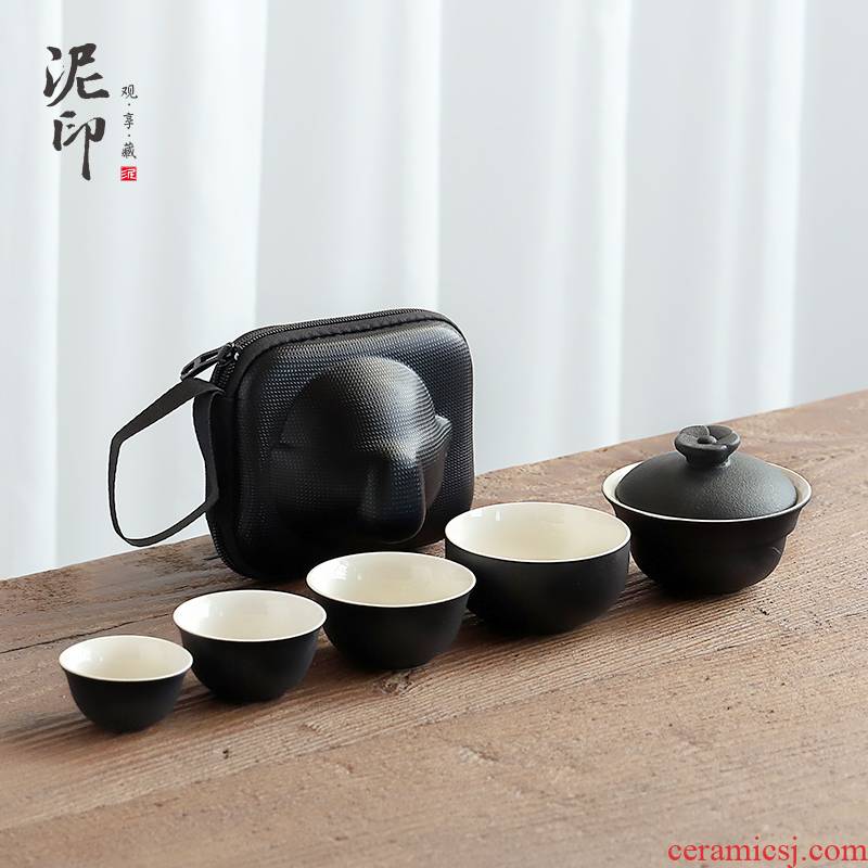 Black pottery mud seal portable travel tea set a pot of four cups of tureen crack cup teapot with Japanese custom logo