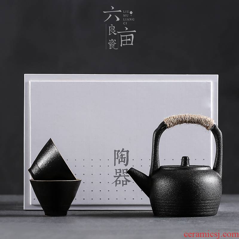 Thick now Japanese zen pot of four cups of tea set teapot teacup, black pottery ceramic tea set of group travel pack