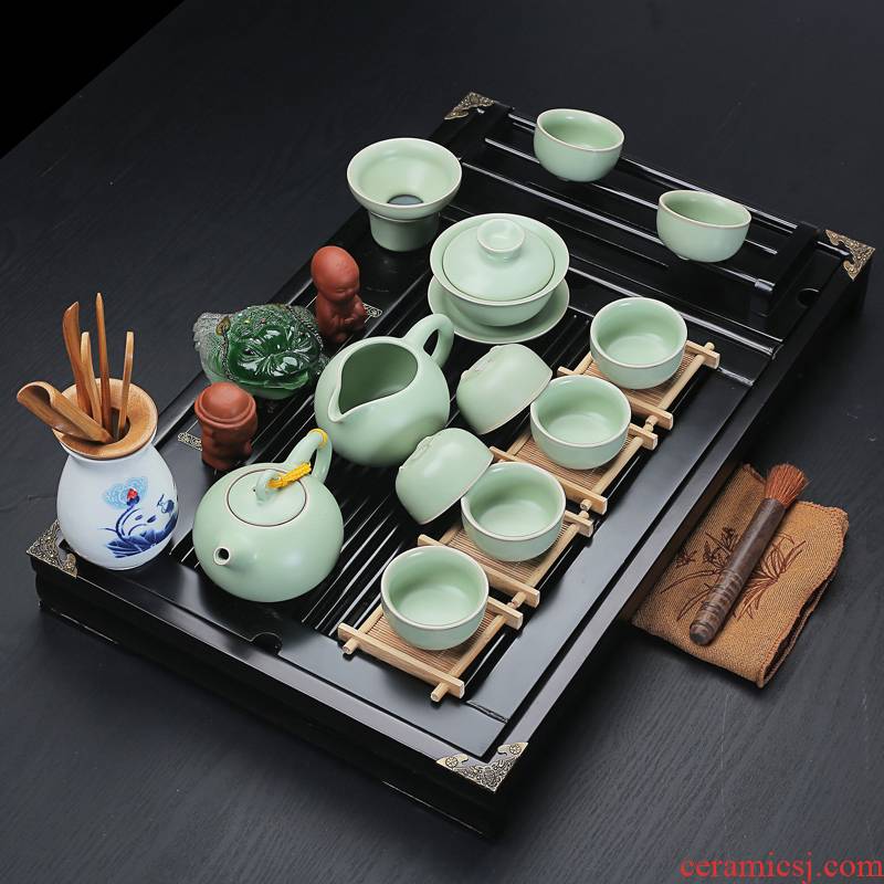 Old &, large kung fu tea set home tea tray was solid wood violet arenaceous kettle black cup frame is a complete set of ceramic tea