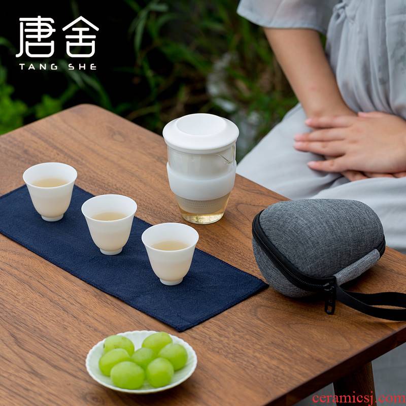 Don difference up suet jade porcelain crack cup against a pot of three cups of hot ceramics glass portable travel kung fu tea set