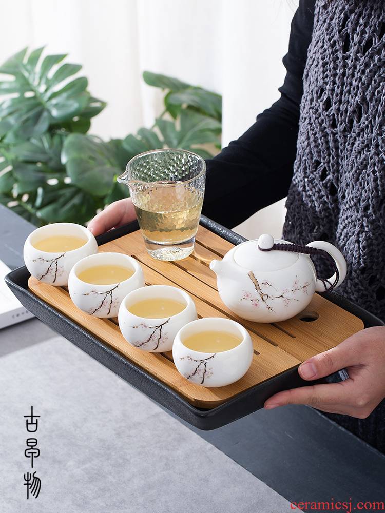 Dehua suet jade white porcelain kung fu tea set suit household contracted is suing portable travel tea pot of ceramic tea tray