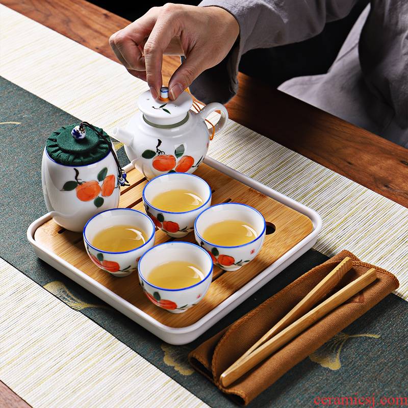 Portable kung fu tea set a pot of four cups of ceramic household crack cup is suing travel teapot dry tea tray