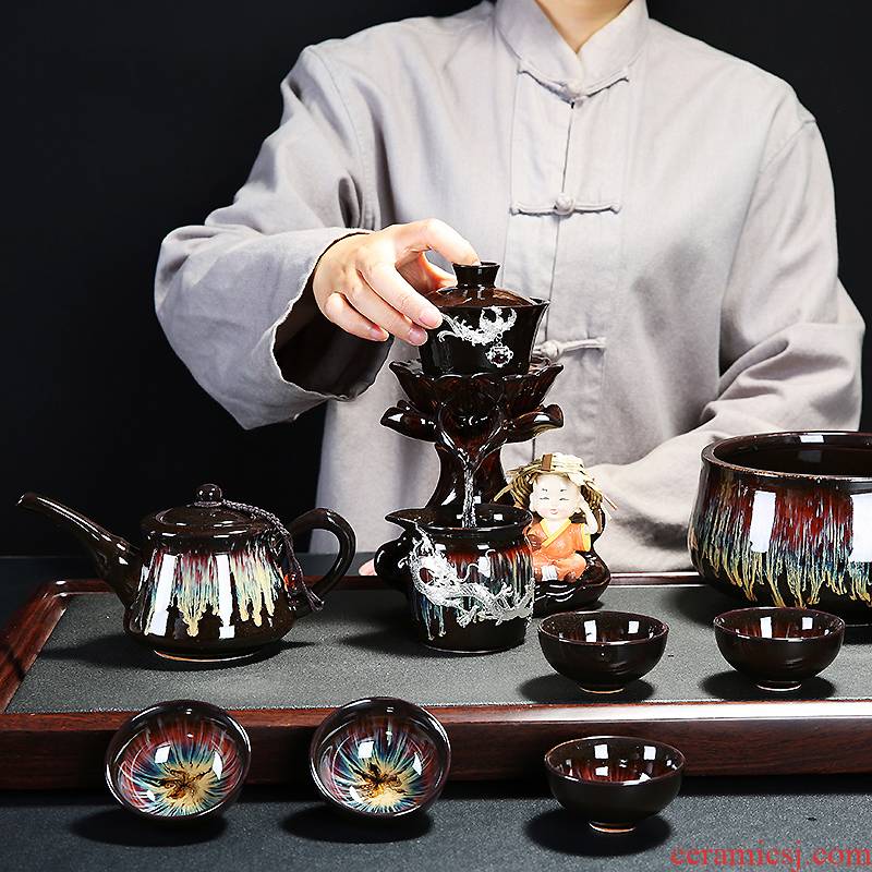 Automatic kung fu tea set ceramic lazy stone mill creative Chinese teapot contracted household tea tea cups