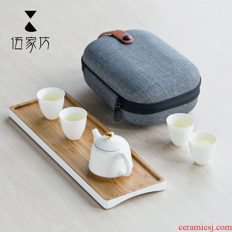 The Wu family fang portable travel ceramic contracted and I a pot of tea set four cups with two cups of tea tray suits for