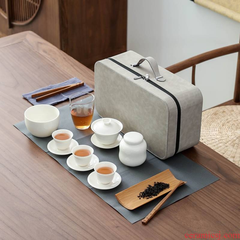 The Set of travel group of dehua white porcelain ceramic tea Set, tea art would suit portable package kung fu tea tureen contracted