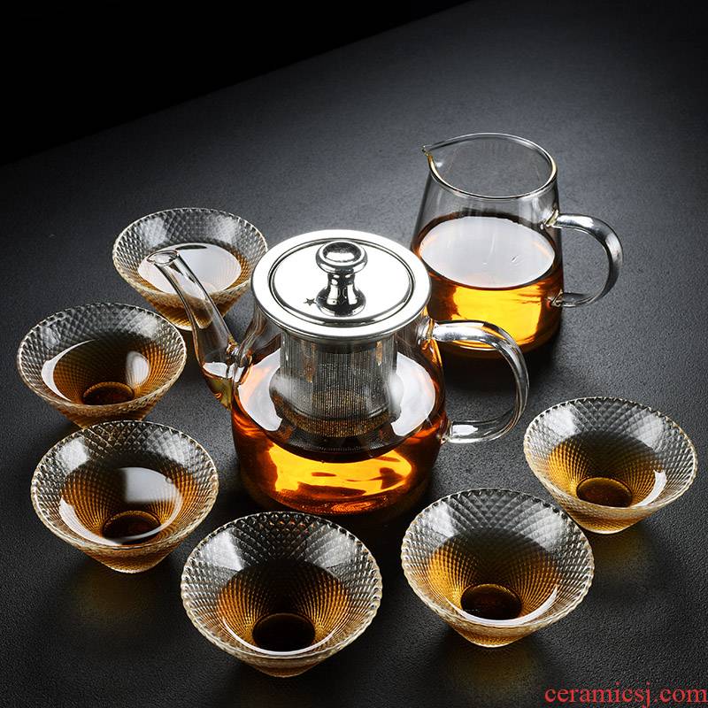 Old thickening hammer at the grid glass tea set kung fu tea cups filter electric teapot TaoLu boiled tea tea tray