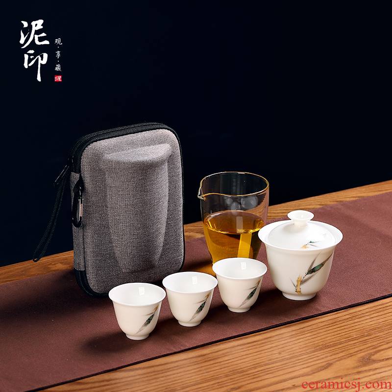 Travel mud seal dehua white porcelain tea set suit portable bag in a pot of three cups of ceramics with hand - made Japanese custom