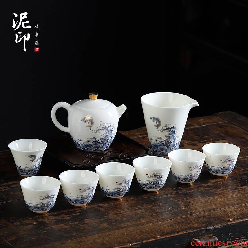 Mud printed white porcelain tea set suit small household kung fu tea cups dehua white porcelain teapot. A complete set of gift box office
