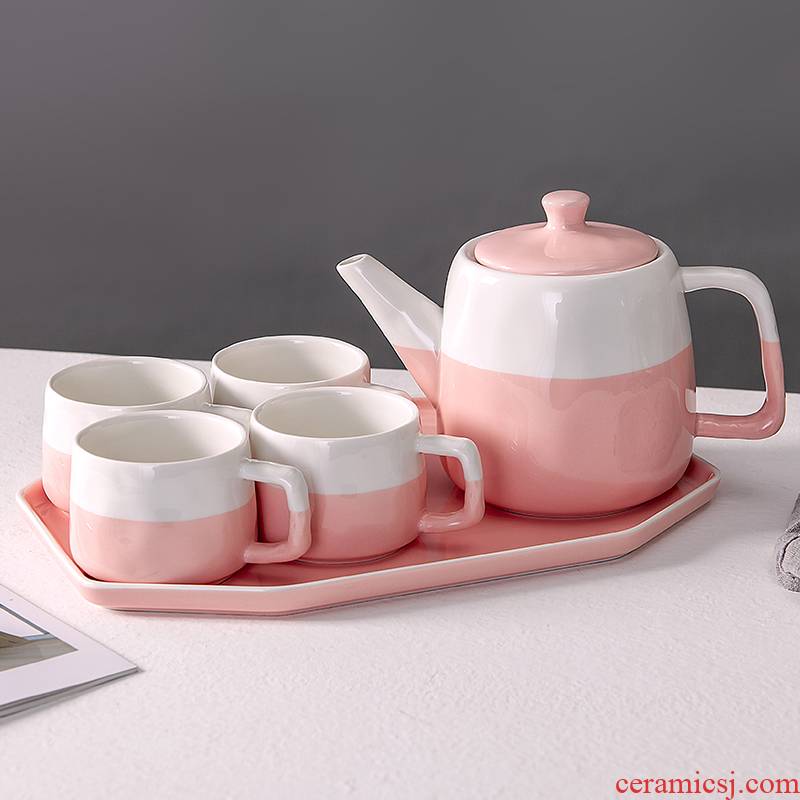 The Home is pure and fresh and camellia tea in the afternoon tea set of ceramic tea cup teapot cold pot with water in a suit