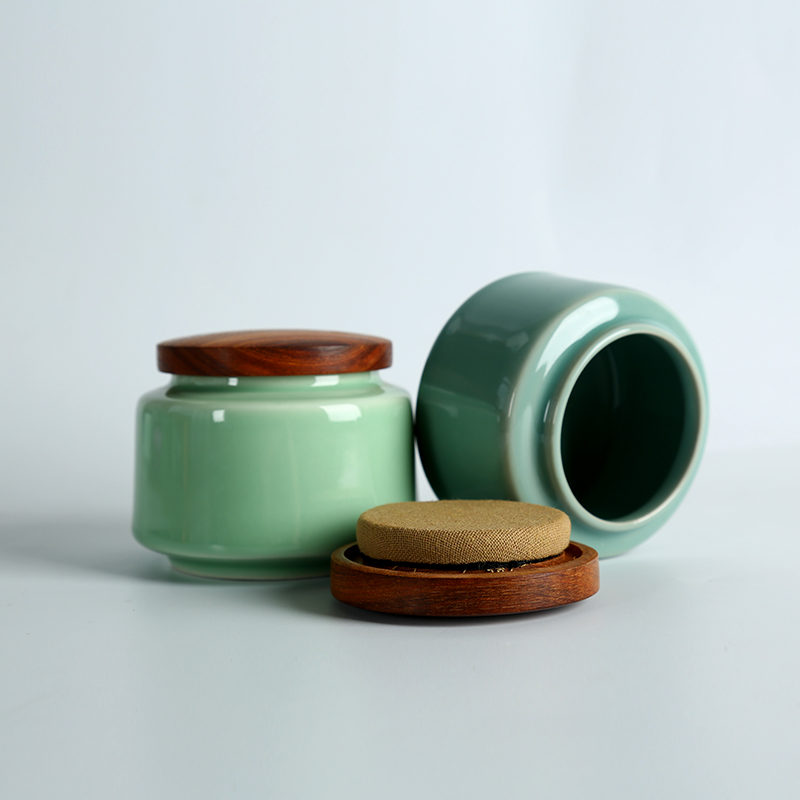 Longquan celadon caddy fixings solid wood storage tank lid ceramic seal tank storage POTS trumpet pu 'er tea boxes