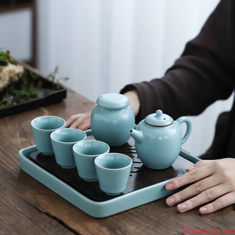Travel porcelain heng tong kung fu tea set suit portable package a pot of four cups of dry tea cup tea tray tea is suing the car