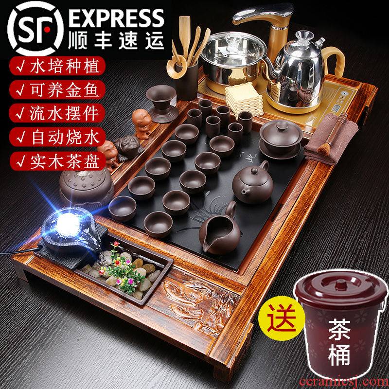 Hui shi, a complete set of automatic water tea set household kung fu solid wood tea tray zisha teapot tea on sale