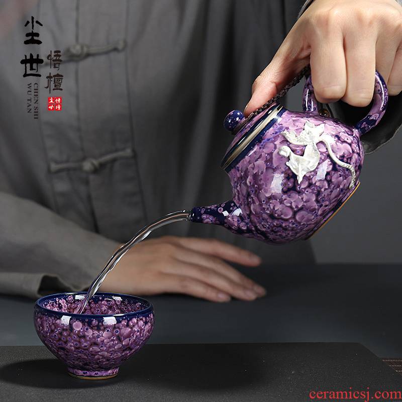 Portable ceramic kung fu tea set a pot of two cups of travel with box of variable coppering. As silver teapot tea set