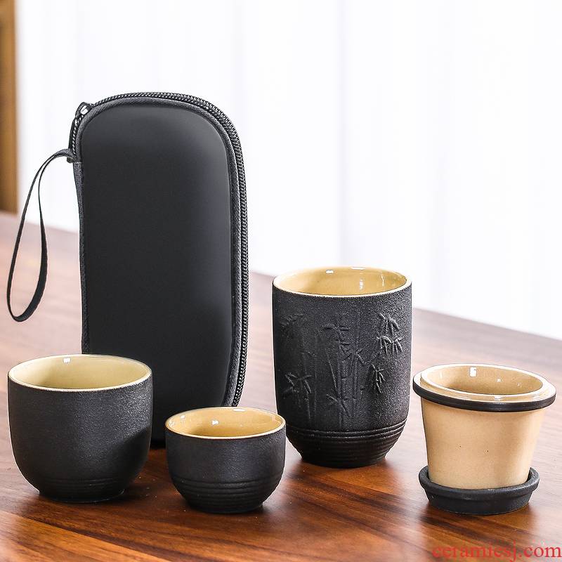 A pot of black pottery travel four cups of portable carry - on bag crack cup kung fu tea set teapot trill